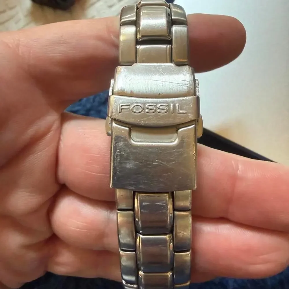 Fossil blue dial watch with silver band